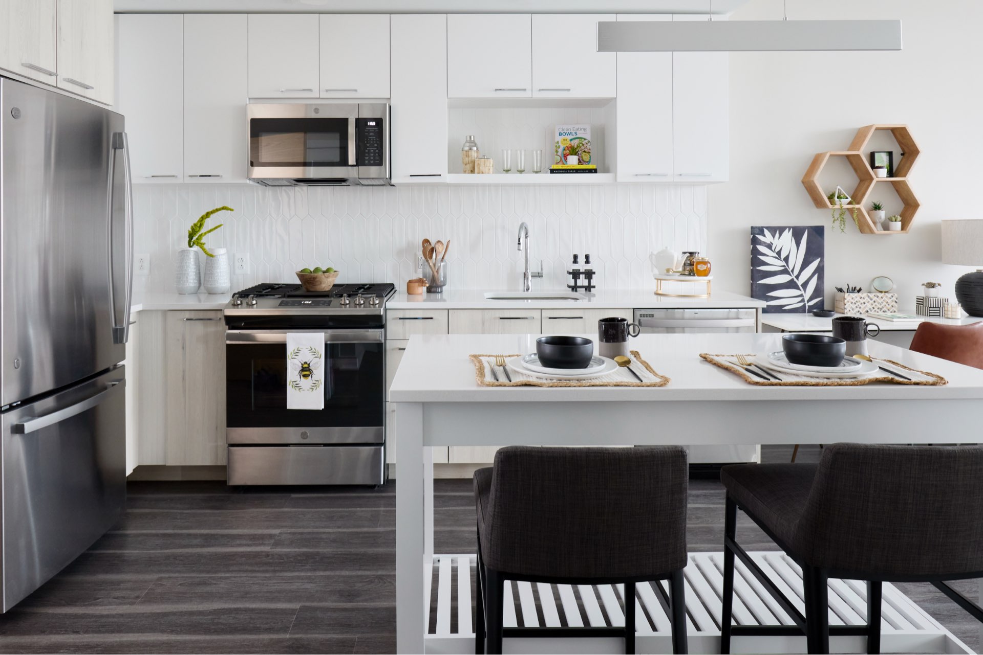 Reese features gourmet kitchens with energy efficient stainless steel appliances, quartz countertops and undermount sinks